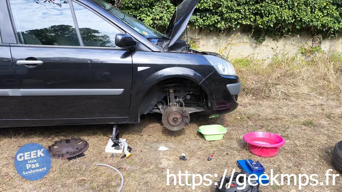 Changement pompe lave glace scenic II